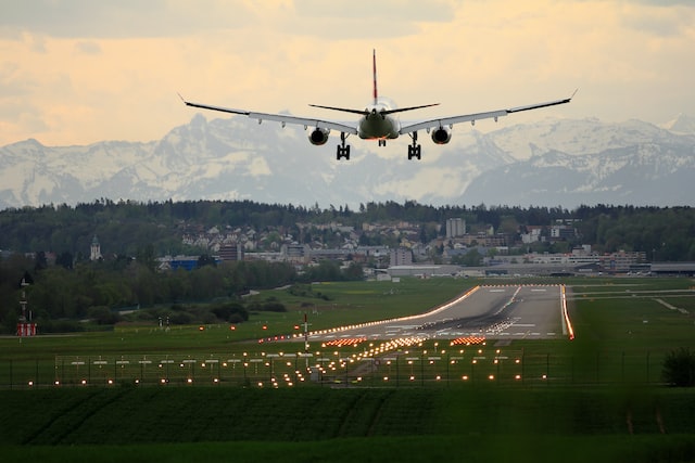 image of airplane landing for landing page app